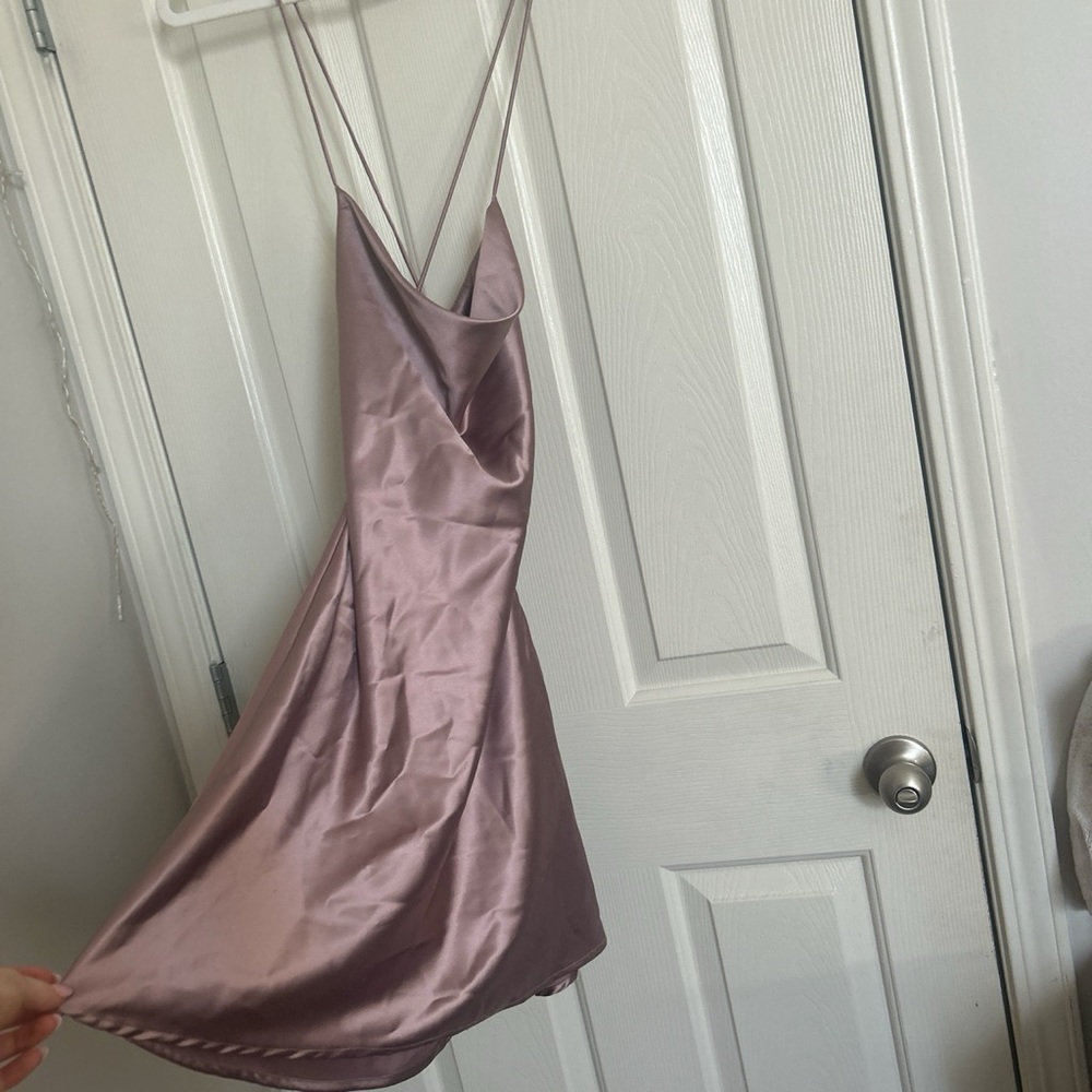 Size small, pretty silk dress, adjustable, tie in the back